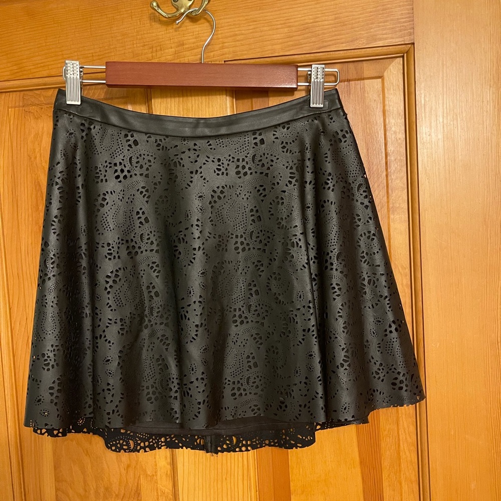 Black leather A-line mini skirt GUESS brand Size 4
